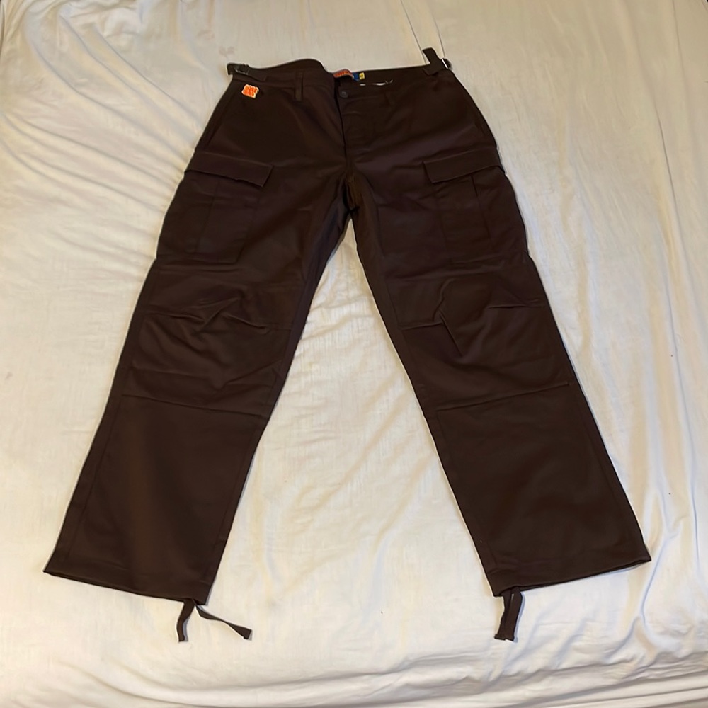 Brown cargo Empyre pants.